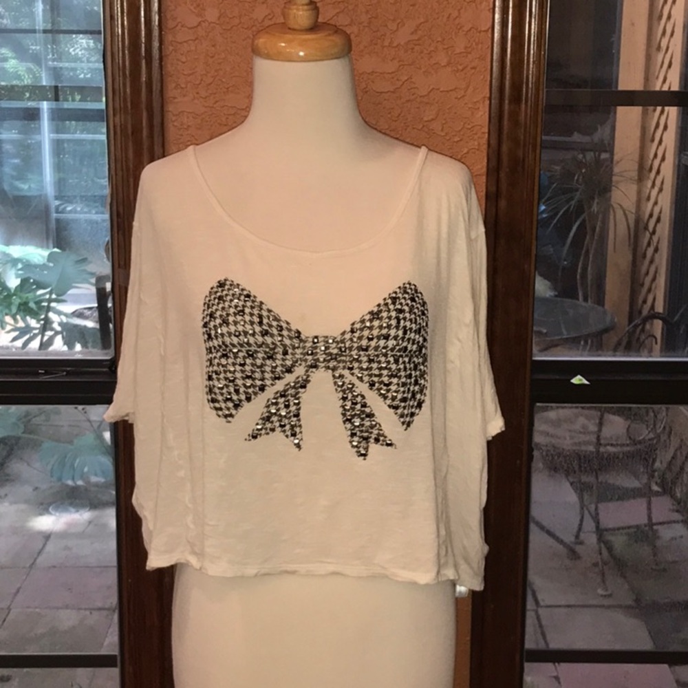 Top with studded bow